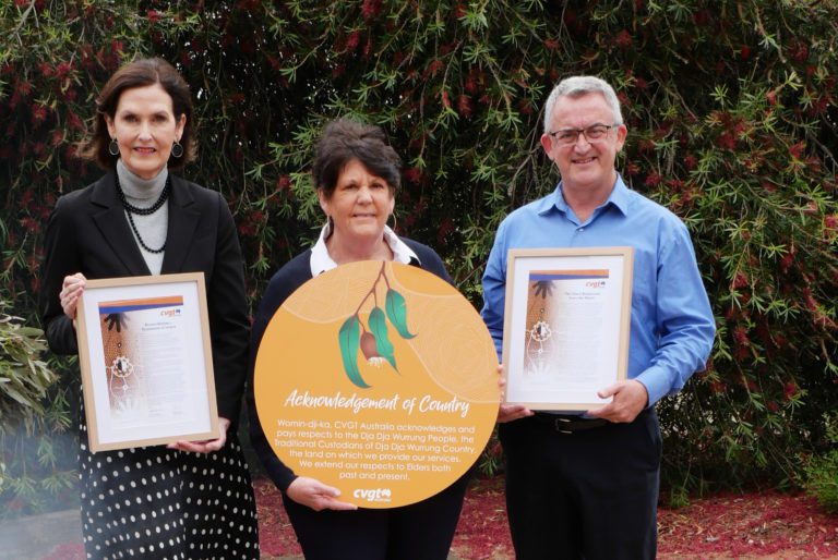 CVGT team with Acknowledgement of Country plaque