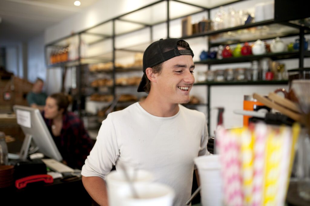 young male barista working at cafe austockphoto 000011571