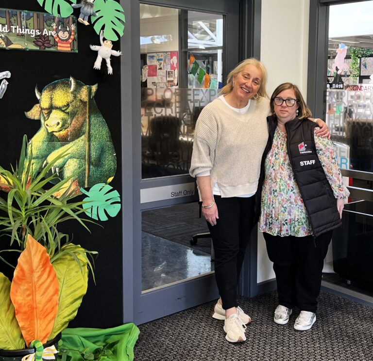 Brooke who has Down syndrome with co worker at primary school.